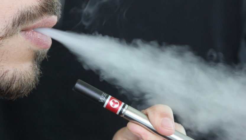 a guy vaping