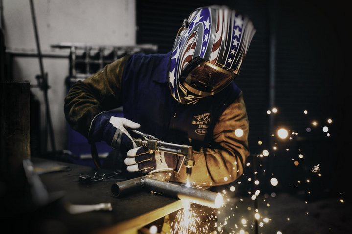 a welder in a protective suit